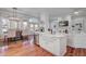 Open-concept kitchen with stainless steel appliances and a dining area bathed in natural light at 5208 Holly Forest, Hollywood, SC 29449