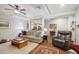 Open concept living room with wood floors, ceiling fan, recessed lighting, and comfortable furniture at 5208 Holly Forest, Hollywood, SC 29449