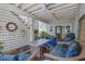 Covered patio featuring comfortable wicker furniture, a ceiling fan, and plenty of space for outdoor entertaining at 5208 Holly Forest, Hollywood, SC 29449