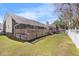 Well-maintained backyard featuring a spacious wooden deck and a lush green lawn at 5286 Waterview Dr, North Charleston, SC 29418