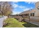 Well-maintained backyard with a deck, stairs, and lush lawn, perfect for outdoor activities at 5286 Waterview Dr, North Charleston, SC 29418