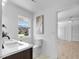Bathroom featuring modern fixtures, double sinks, and neighborhood views at 5286 Waterview Dr, North Charleston, SC 29418