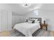 Cozy bedroom featuring a sloped ceiling, neutral colors, and warm lighting at 5286 Waterview Dr, North Charleston, SC 29418