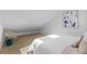 Bright bedroom featuring wood floors, peaked ceiling, and white furniture at 5286 Waterview Dr, North Charleston, SC 29418
