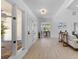 Entryway with a view of a living room and dining area with lots of natural light at 5286 Waterview Dr, North Charleston, SC 29418