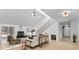 Cozy living room featuring a black fireplace, modern decor, and light wood floors at 5286 Waterview Dr, North Charleston, SC 29418
