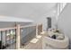 Open loft space featuring hardwood floors, natural light, and seating area at 5286 Waterview Dr, North Charleston, SC 29418