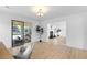Bright and open office with light wood floors and sliding glass doors at 5286 Waterview Dr, North Charleston, SC 29418