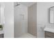 Bright shower with neutral toned tile, brass fixtures and recessed shower caddy at 5286 Waterview Dr, North Charleston, SC 29418