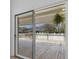 Exterior sliding door looks out onto a deck with a white railing at 5286 Waterview Dr, North Charleston, SC 29418