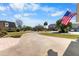 Neighborhood street featuring well-maintained homes, manicured lawns, and mature trees at 5286 Waterview Dr, North Charleston, SC 29418