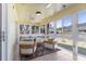 Inviting sunroom with ample seating and scenic backyard views at 5286 Waterview Dr, North Charleston, SC 29418