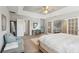 Comfortable main bedroom showcasing a cozy seating area and neutral decor at 5556 Indigo Fields Blvd, North Charleston, SC 29418