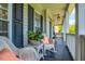 Relaxing front porch with wicker seating at 5556 Indigo Fields Blvd, North Charleston, SC 29418