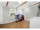 Convenient laundry area with wood floors and natural light offering practicality and style at 5801 Chaucer Dr, Hanahan, SC 29410