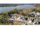 Aerial view featuring a home marked with a red pin in a neighborhood near a large lake at 6005 Coral Berry Rd, Hanahan, SC 29410