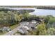 An aerial view shows the homes nestled near the serene lake at 6005 Coral Berry Rd, Hanahan, SC 29410