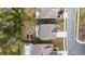 Overhead view highlighting the home's backyard with a fire pit, patio, swing, and swimming pool at 6005 Coral Berry Rd, Hanahan, SC 29410