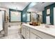 Bathroom featuring dual sinks, a chandelier, shower, and soaking tub at 6005 Coral Berry Rd, Hanahan, SC 29410