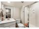 Well-lit bathroom with a glass-enclosed shower, single vanity, and neutral décor at 6005 Coral Berry Rd, Hanahan, SC 29410