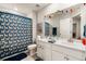 Bright bathroom featuring a double vanity, llama art, and a playful llama-themed shower curtain at 6005 Coral Berry Rd, Hanahan, SC 29410