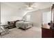 Cozy bedroom featuring plush carpet, a comfortable bed, and a ceiling fan for added comfort at 6005 Coral Berry Rd, Hanahan, SC 29410