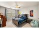 Bedroom with a desk, ceiling fan, and artwork at 6005 Coral Berry Rd, Hanahan, SC 29410