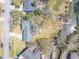 Aerial view of home featuring lush landscaping, canal access, and neighborhood at 689 Port Cir, Charleston, SC 29412