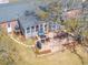 Aerial of deck with outdoor furniture, patio, and beautiful backyard landscaping at 689 Port Cir, Charleston, SC 29412