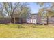 Backyard shed and play structure offer lots of outdoor activities at 689 Port Cir, Charleston, SC 29412