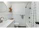Updated bathroom featuring subway tile in the shower/tub, sleek black fixtures, and a modern vanity with ample storage space at 689 Port Cir, Charleston, SC 29412
