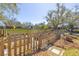 Large fenced garden area with planting beds, offering privacy and gardening enjoyment at 689 Port Cir, Charleston, SC 29412