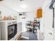 Functional laundry room with modern washer and dryer, shelving for storage, and bright lighting for added convenience at 689 Port Cir, Charleston, SC 29412