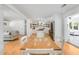 Open floor plan connects the dining area, kitchen, and living room with beautiful hardwood floors at 689 Port Cir, Charleston, SC 29412