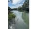A serene waterfront view offering direct water access and tranquil surroundings for a relaxing lifestyle at 689 Port Cir, Charleston, SC 29412