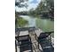 Enjoy the waterfront lifestyle with seating on the dock and beautiful views of the waterway at 689 Port Cir, Charleston, SC 29412