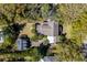 Drone shot of a home with a dark gray roof, set on a manicured lawn at 7 Guerard Rd, Charleston, SC 29407