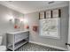 Stylish bathroom featuring a marble countertop vanity and a patterned tile floor at 7 Guerard Rd, Charleston, SC 29407