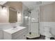 Modern bathroom featuring a glass-enclosed shower with white tile and updated fixtures at 7 Guerard Rd, Charleston, SC 29407