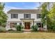 Charming two-story home featuring a welcoming entrance and well-maintained lawn at 7 Guerard Rd, Charleston, SC 29407