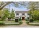 Stunning two-story home with manicured front yard and mature trees at 7 Guerard Rd, Charleston, SC 29407