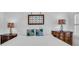 Cozy bedroom with decorative pillows and lamps at 7858 Gull Bay Dr, Awendaw, SC 29429