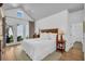 Bright main bedroom featuring a vaulted ceiling, ample natural light, and a cozy atmosphere at 7858 Gull Bay Dr, Awendaw, SC 29429