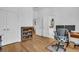 Open office with hardwood floors and neutral colors at 7858 Gull Bay Dr, Awendaw, SC 29429