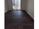 Bedroom featuring modern floors with a sliding glass door that fills the space with natural light at 7945 Edgebrook Cir # B, North Charleston, SC 29418