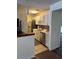 Bright kitchen with white cabinets, stainless steel appliances and tiled floors at 7945 Edgebrook Cir # B, North Charleston, SC 29418