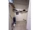 Laundry room with tile flooring, utility connections, and shelves for storage at 7945 Edgebrook Cir # B, North Charleston, SC 29418