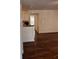 Open living room featuring modern floors leading to a kitchen and dining area with natural light at 7945 Edgebrook Cir # B, North Charleston, SC 29418