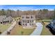 Beautiful home in a lush setting with a charming staircase, manicured lawn and proximity to a golf course at 8638 Scottish Troon Ct, North Charleston, SC 29420