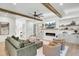 Spacious living room with fireplace, built-in shelves, and comfortable seating area at 8638 Scottish Troon Ct, North Charleston, SC 29420